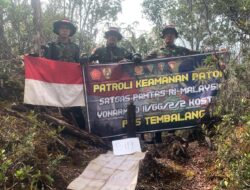 Satgas Pamtas Yonarmed 11 Kostrad Laksanakan Patroli Patok Perbatasan Indonesia Malaysia